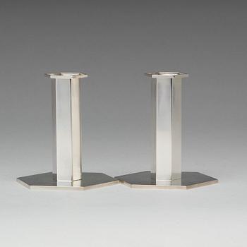 Wiwen Nilsson, a pair of sterling candlesticks, Lund 1964 and 1968.