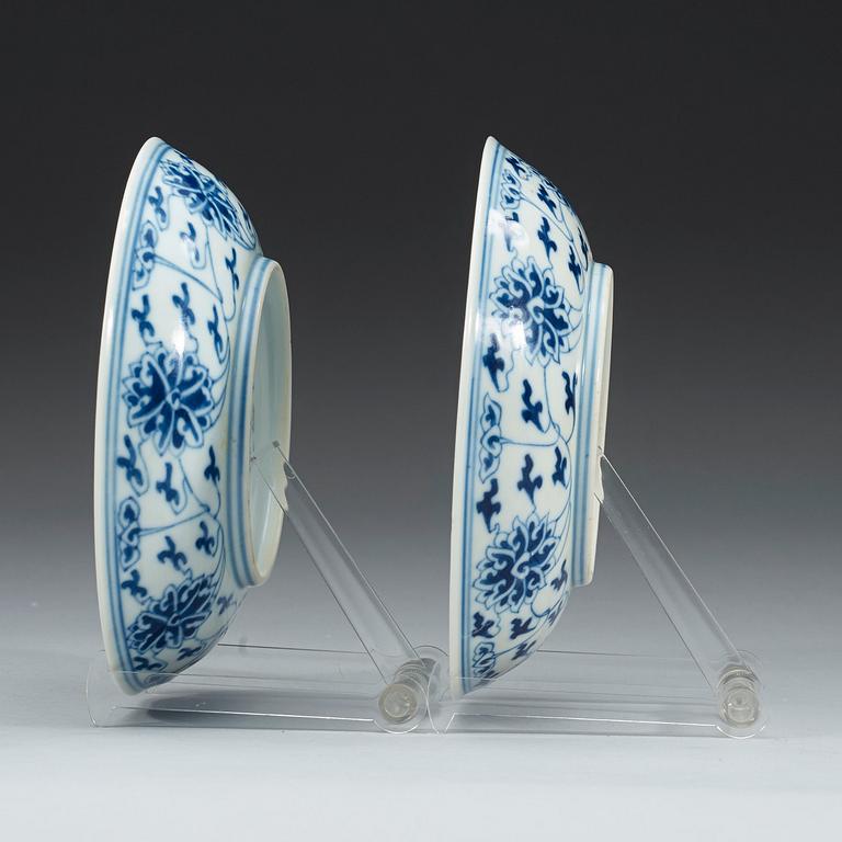 A pair of blue and white lotus dishes, Qing dynasty, Guangxu six character mark and period (1874-1908).