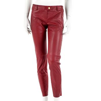 711. ESCADA a pair of red leather trousers, size 36.