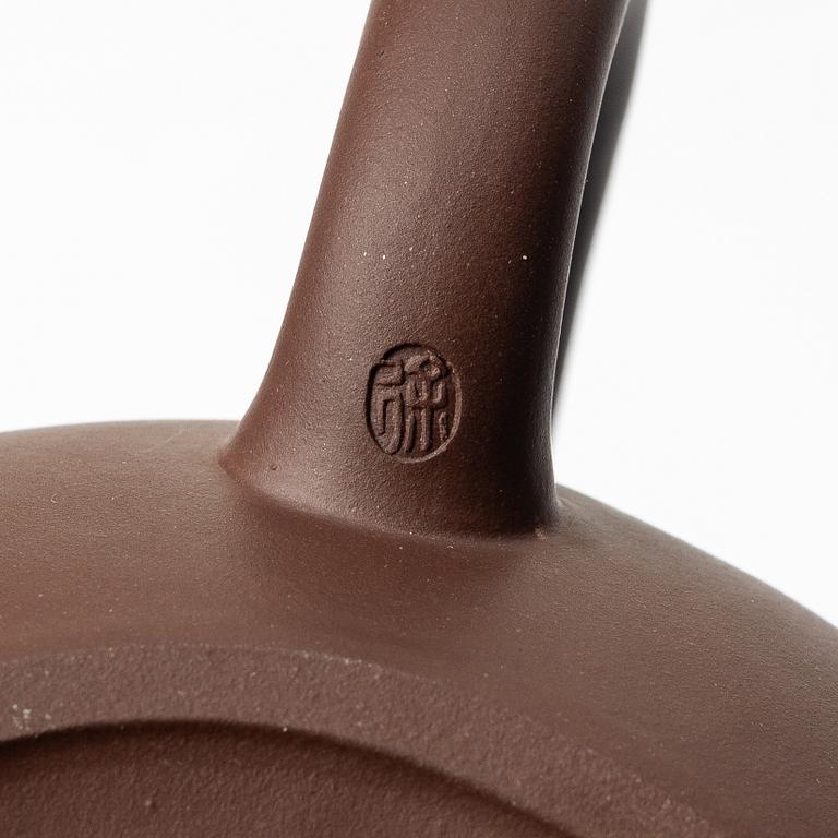 A group of three Chinese yixing teapots, 1960-80s.