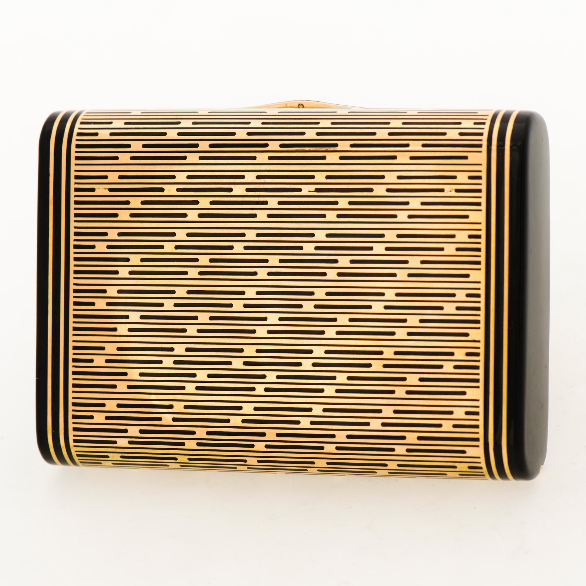 A CARTIER VANITY CASE, 18K gold, enamel, rose cut diamonds. 1930s.