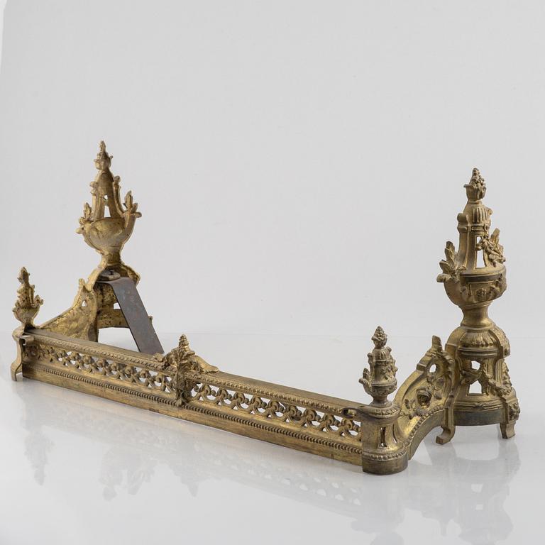 A pair of Louis XVI-style bronze andirons, France, later part of the 19th century.