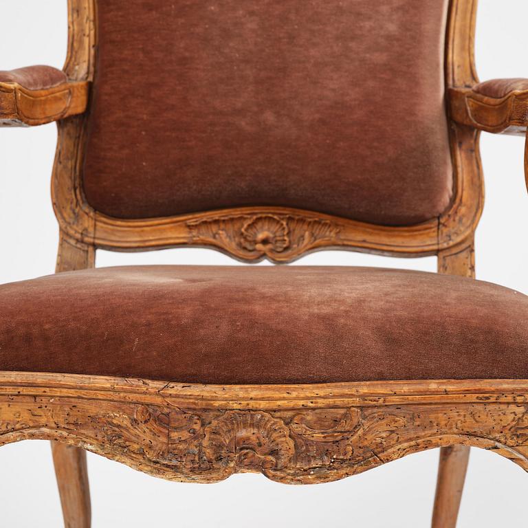 A pair of rococo fauteuils, Stockholm, later part 18th century.