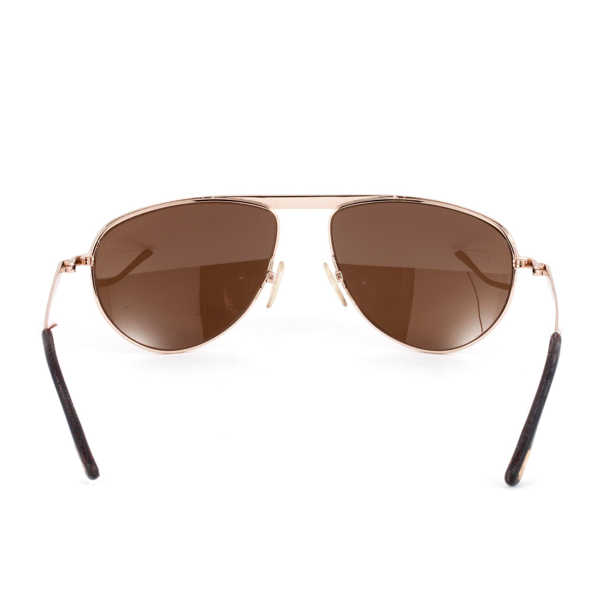 TOM FORD, a pair of sunglasses.