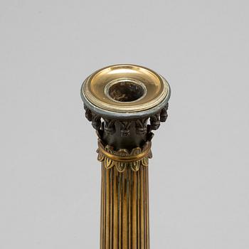 A mid 19th century late empire candlestick.