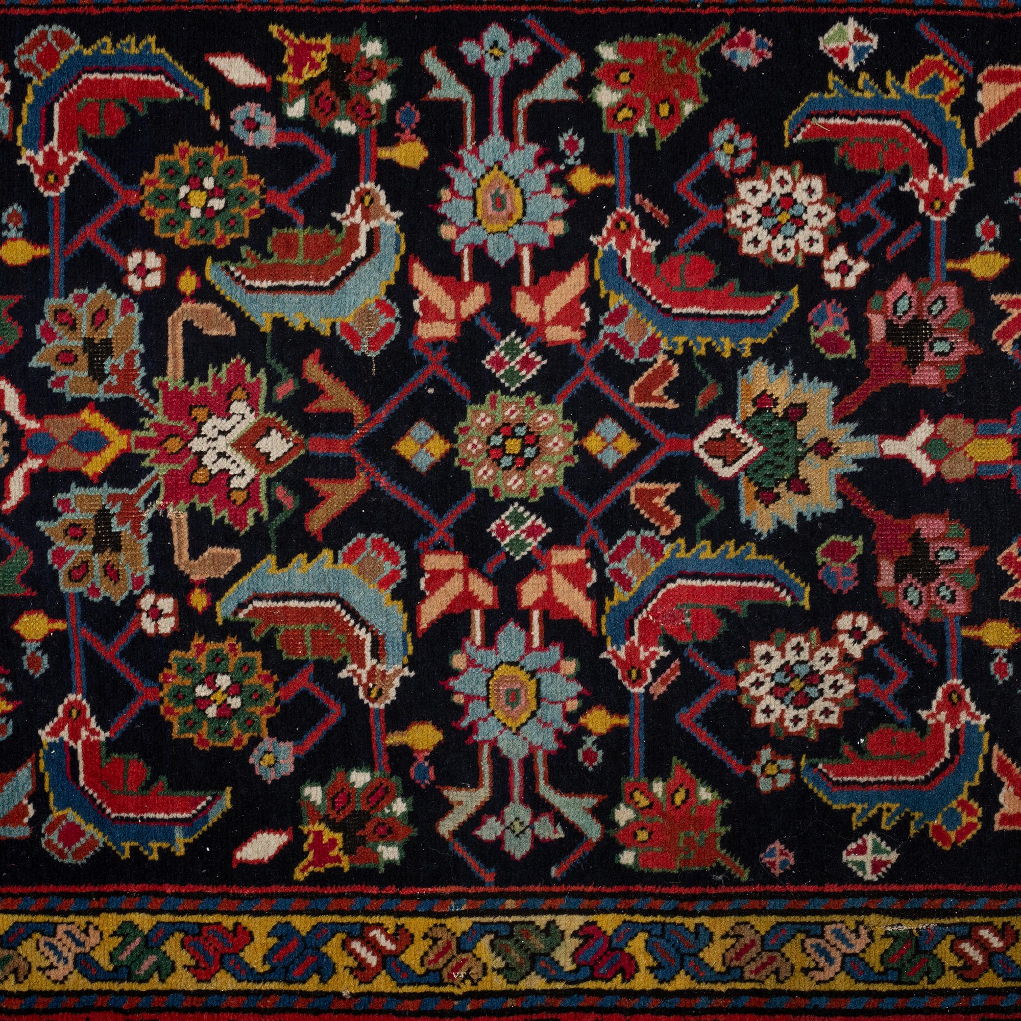 A RUNNER, semi-antique Karabagh, ca 500 x 106 cm.