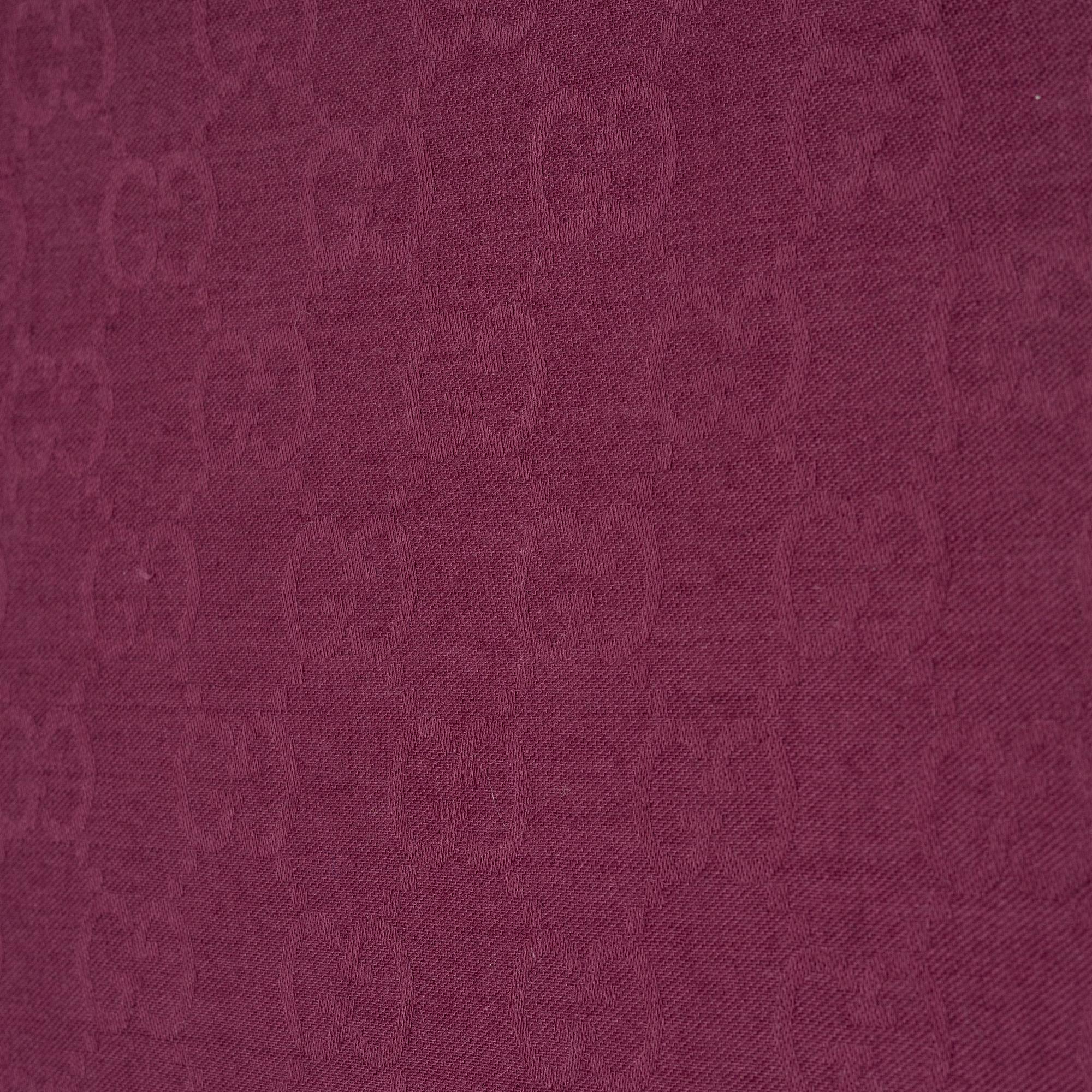 Gucci, a wool and silk mix "GG" jaquard shawl.