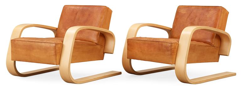 A pair of Alvar Aalto 'Nr 400' elk skin and birch armchairs, Artek, Finland.