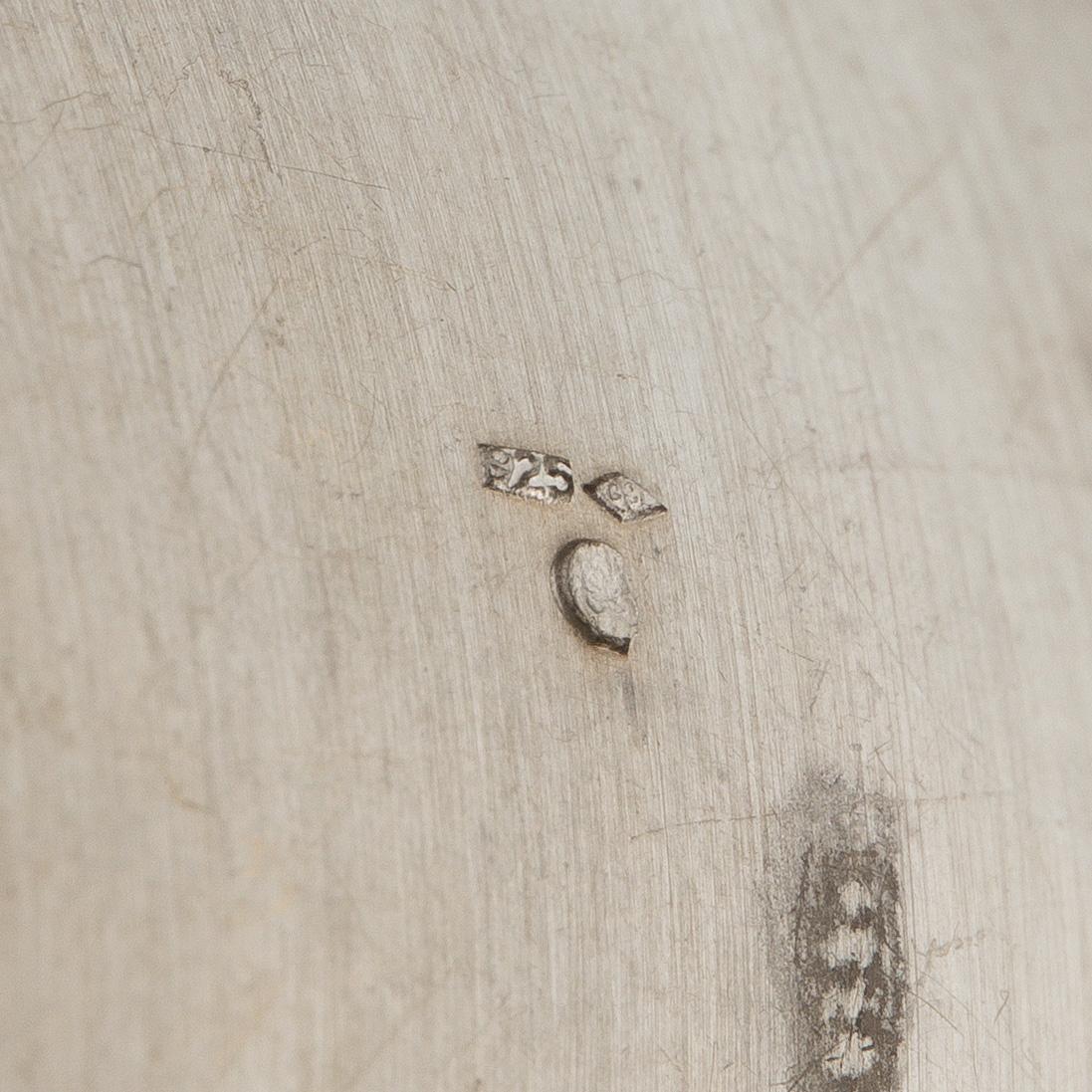 Yves Saint Laurent, armring och hänge, silver.