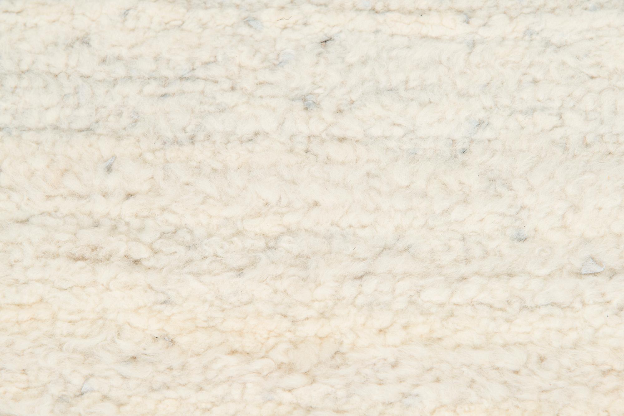 A sheepskin rug. Ca. 140 x 200 cm.