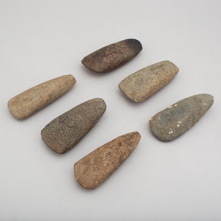 Six neolithic stone axes.