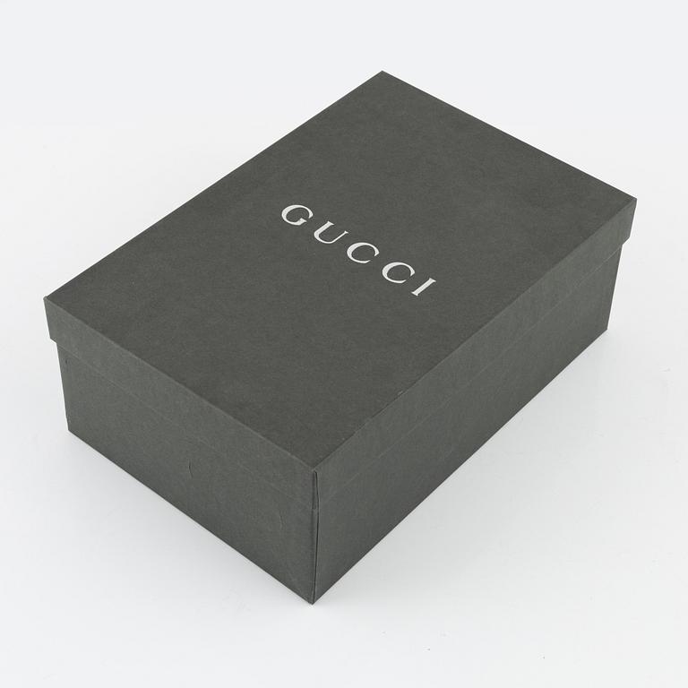 Gucci, a pair of wedge heel shoes, Italian size 36.