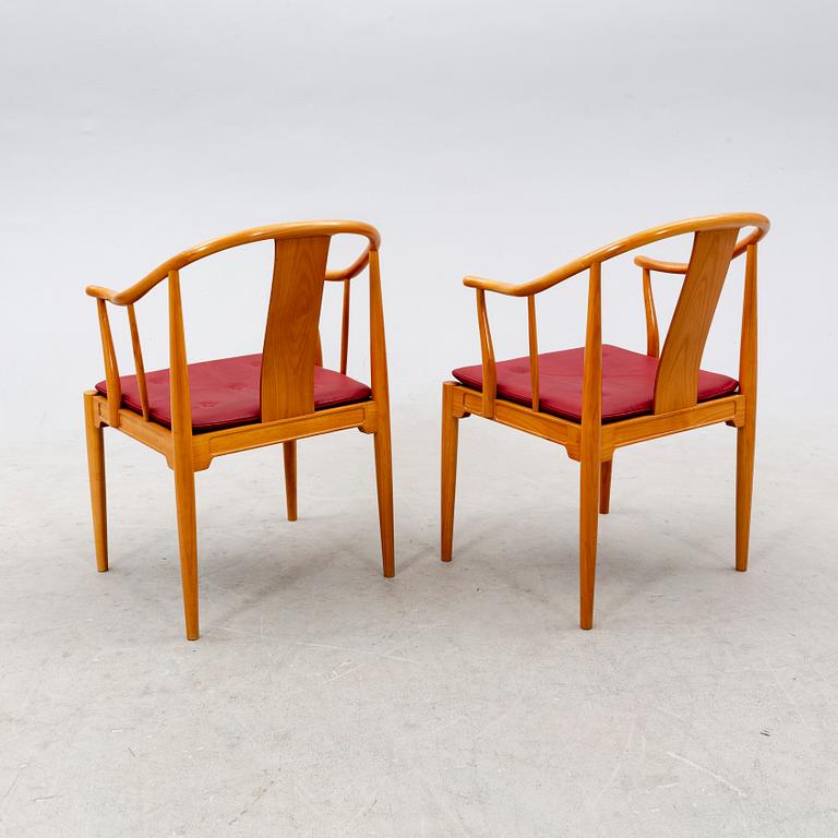 Hans J Wegner, a pair of "China" chairs for Fritz Hansen, Denmark, dated 1994.