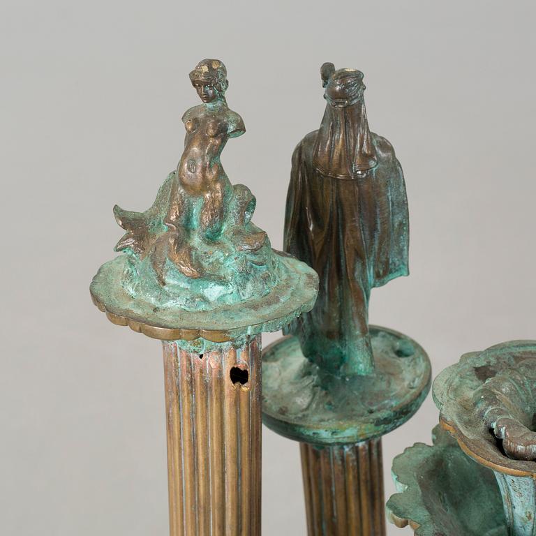 a metal sculpture, signed and dated 1980.