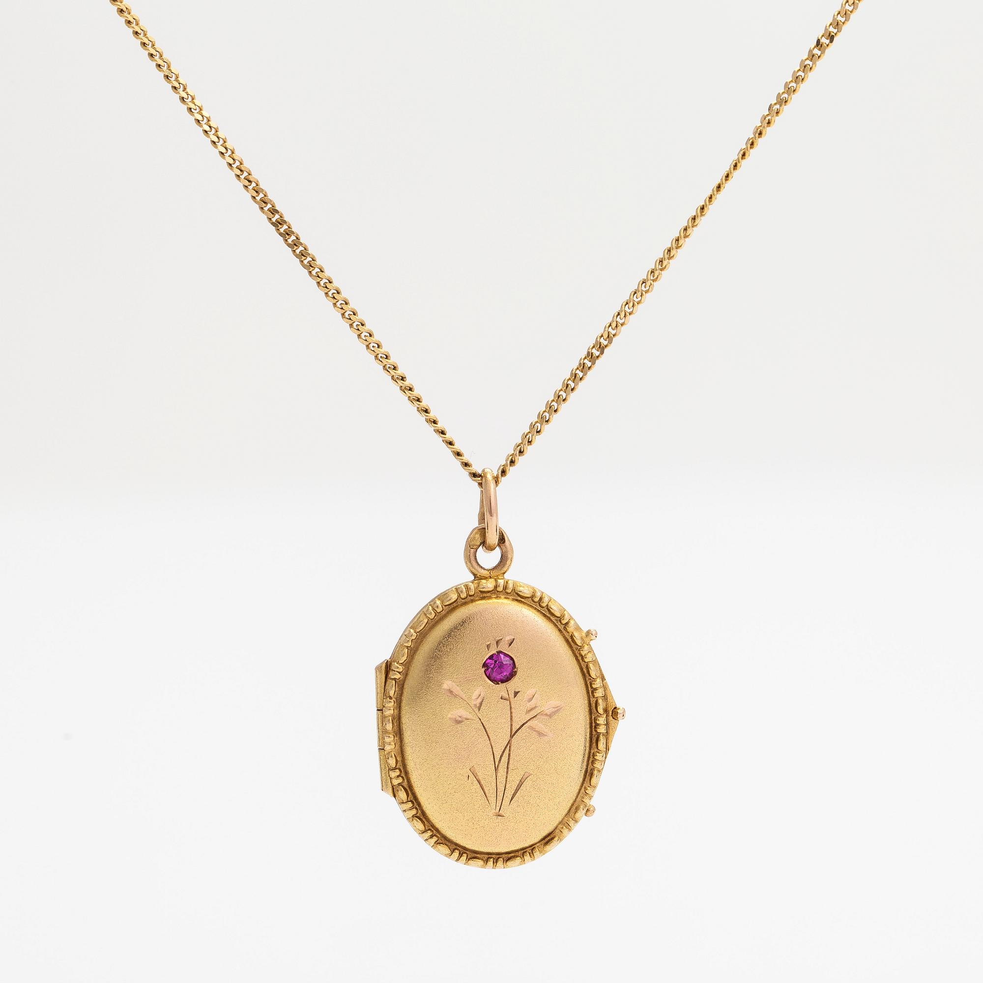 A 14K gold necklace with a locket and a syntetic ruby. Soviet Union.