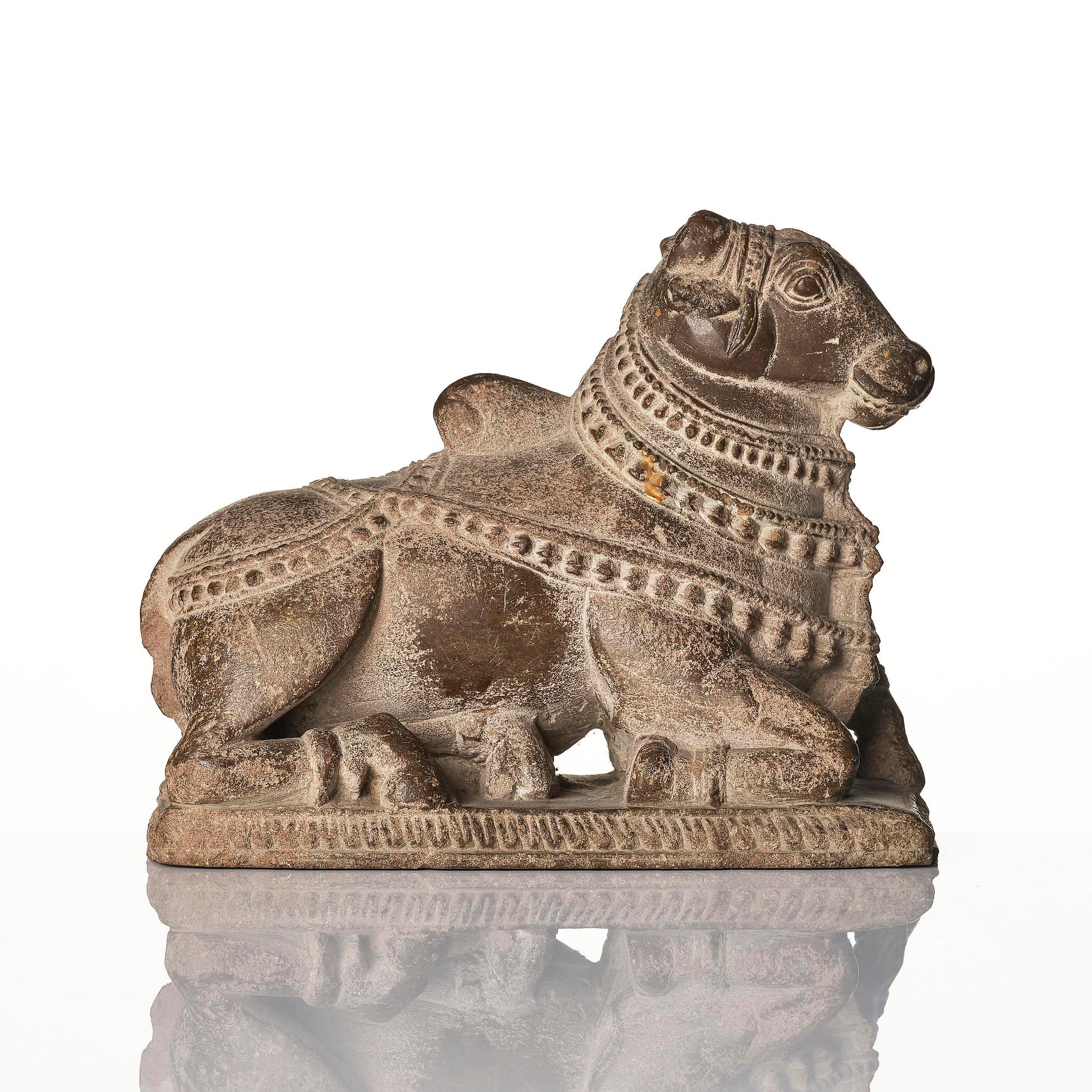 A lime stone sculpture of the bull Nandi, India, 18th/19th century or older.