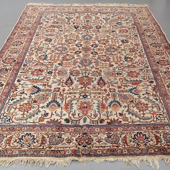 A carpet, semi-antique Tabriz,  342 x 231 cm.