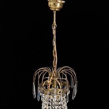 A five light candelabra and two wall scones, Gustavian style, 20th Century.