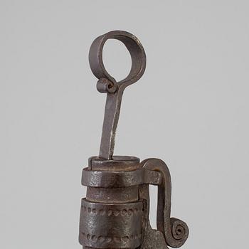 a 1700's-/1800's lock with a key.