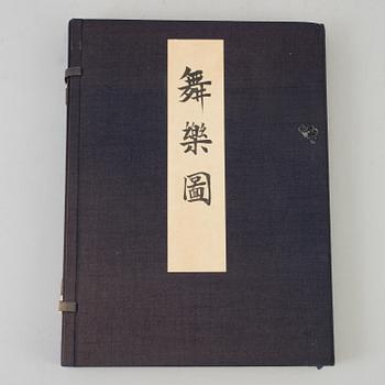 A Japanese book containing two volumes, Tokyo, circa 1900. Color woodblock prints.