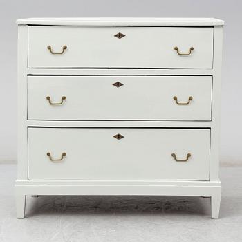 A 19th cnetury chest of drawers.