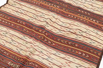 A Persian Kilim rug, c. 300 x 135 cm.