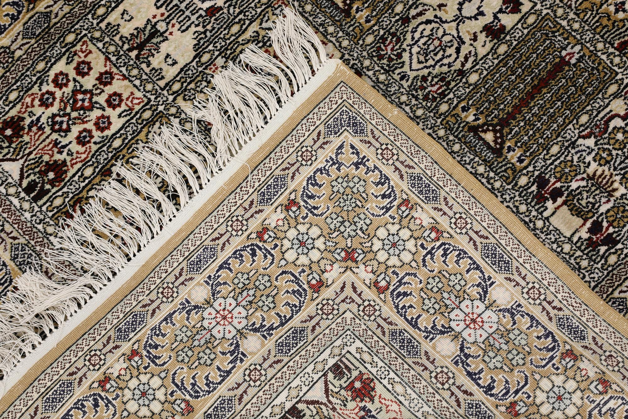 An Oriental silk rug, approx. 122 x 79 cm.