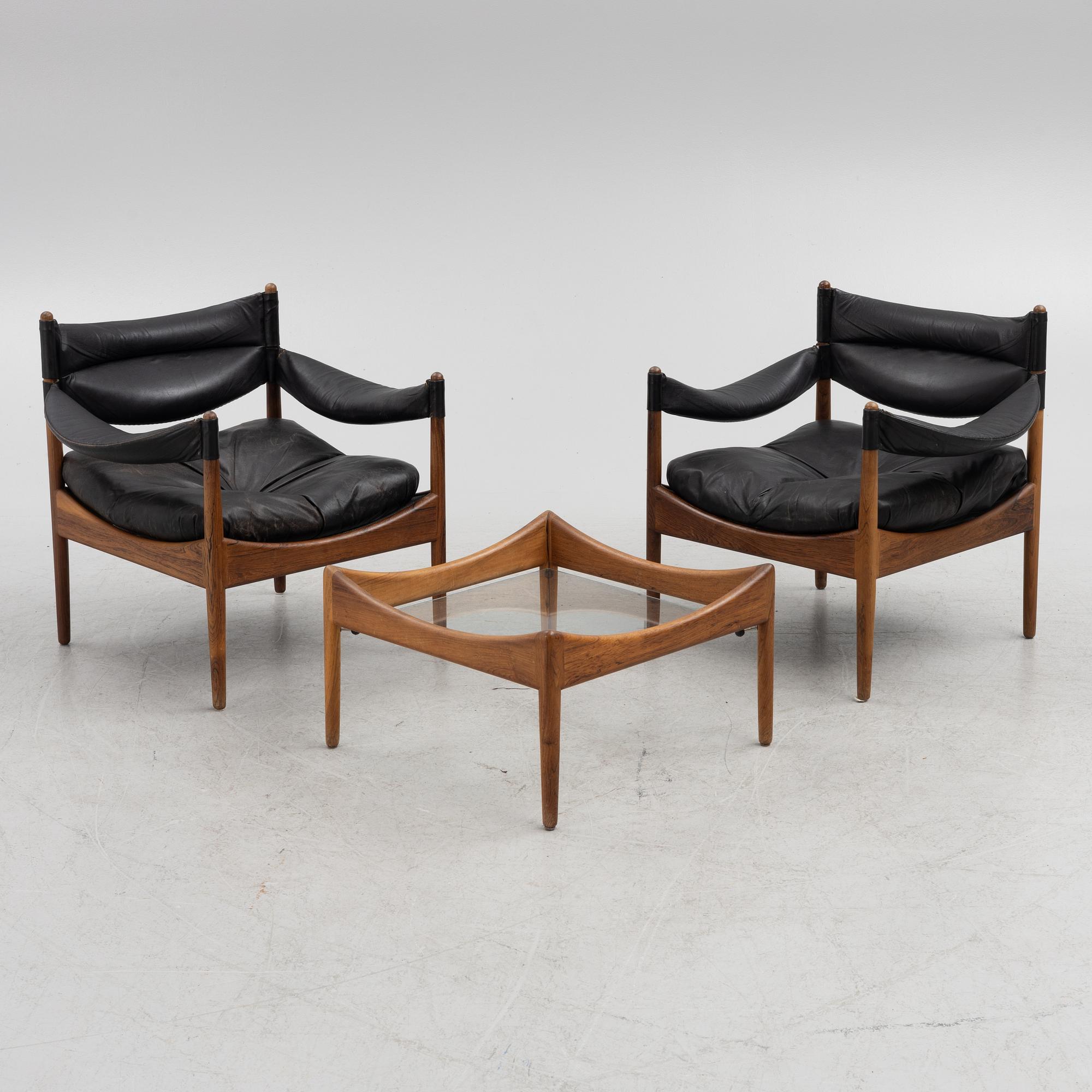 Kristian Solmer Vedel, a pair of "Modus" armchairs and a low table, Søren Willadsen, 1960's.