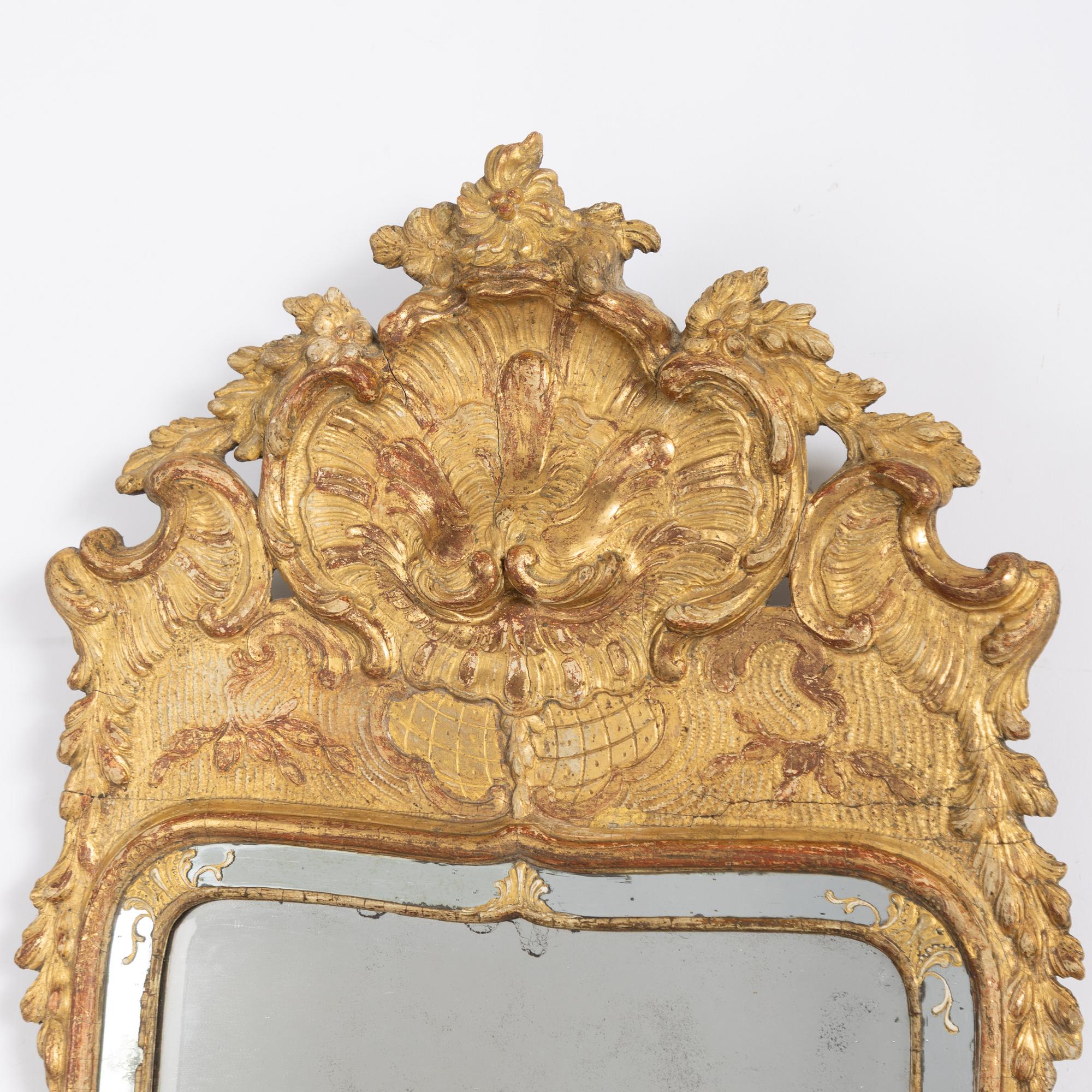 A rococo mirror, second part of the 18th Century.