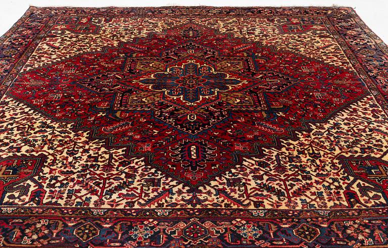 An oriental carpet, c. 330 x 285 cm.