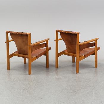 Carl-Axel Acking, A pair of 'Trienna' armchairs, 1950-60s.