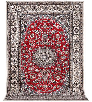A carpet, Nain, part silk, 9 laa, c. 303 x 198 cm.