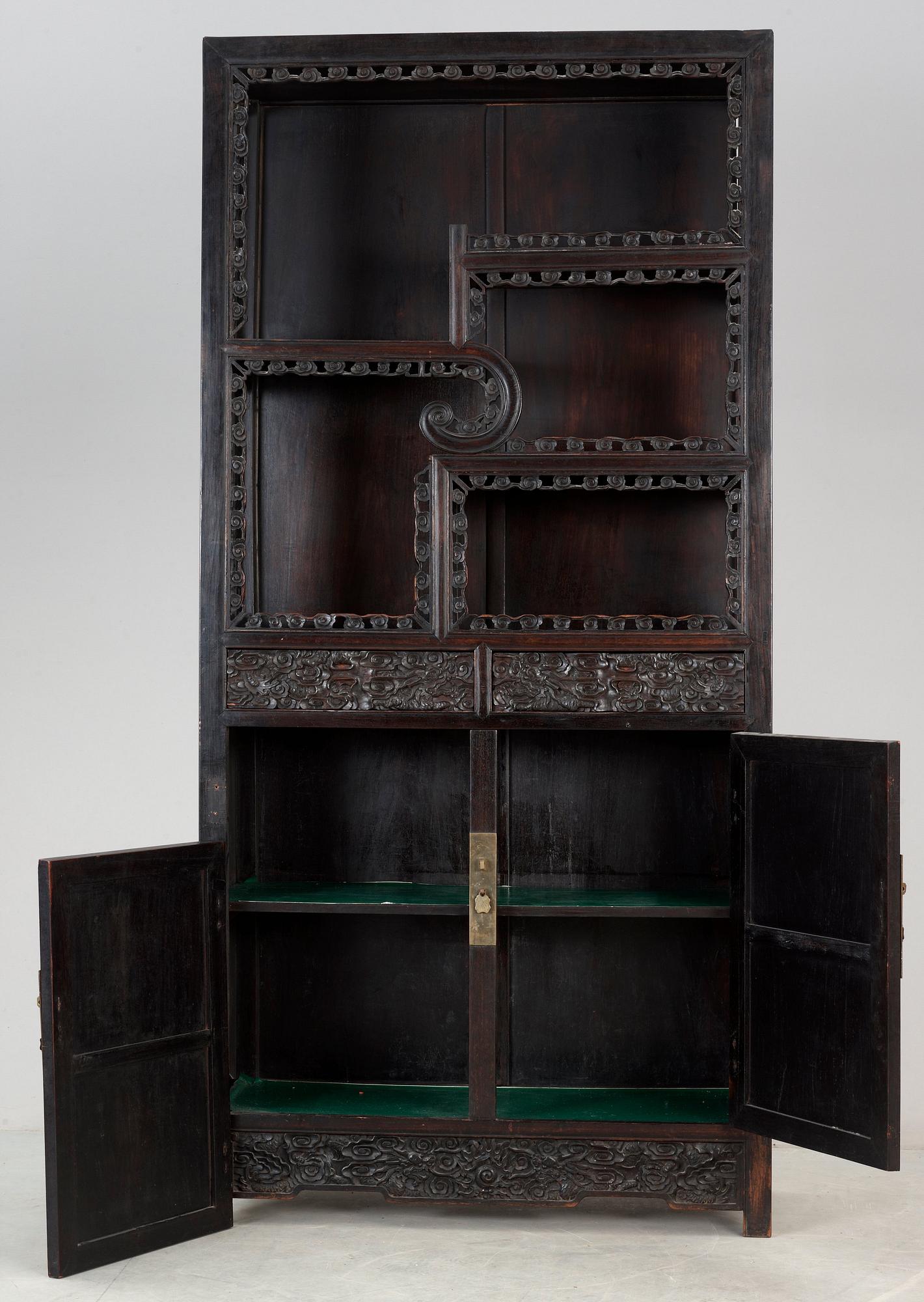 A Chinese hardwood cabinet, early 20th Century.