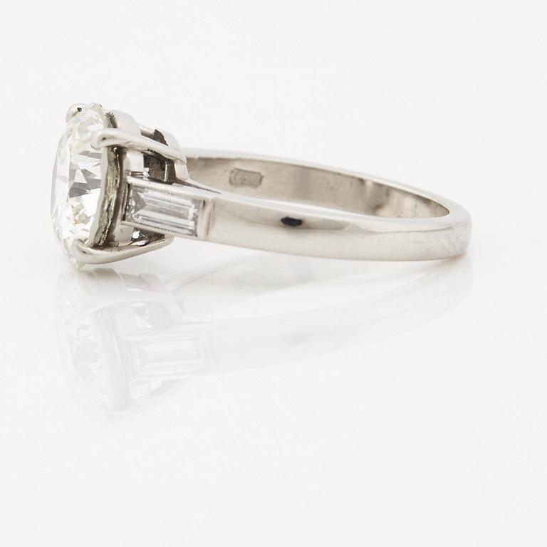 A brilliant- and baguette cut diamond ring, Bentley & Skinner, London.