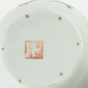 A set of four famille rose boxes with covers and a bowl, late Qing dynasty.