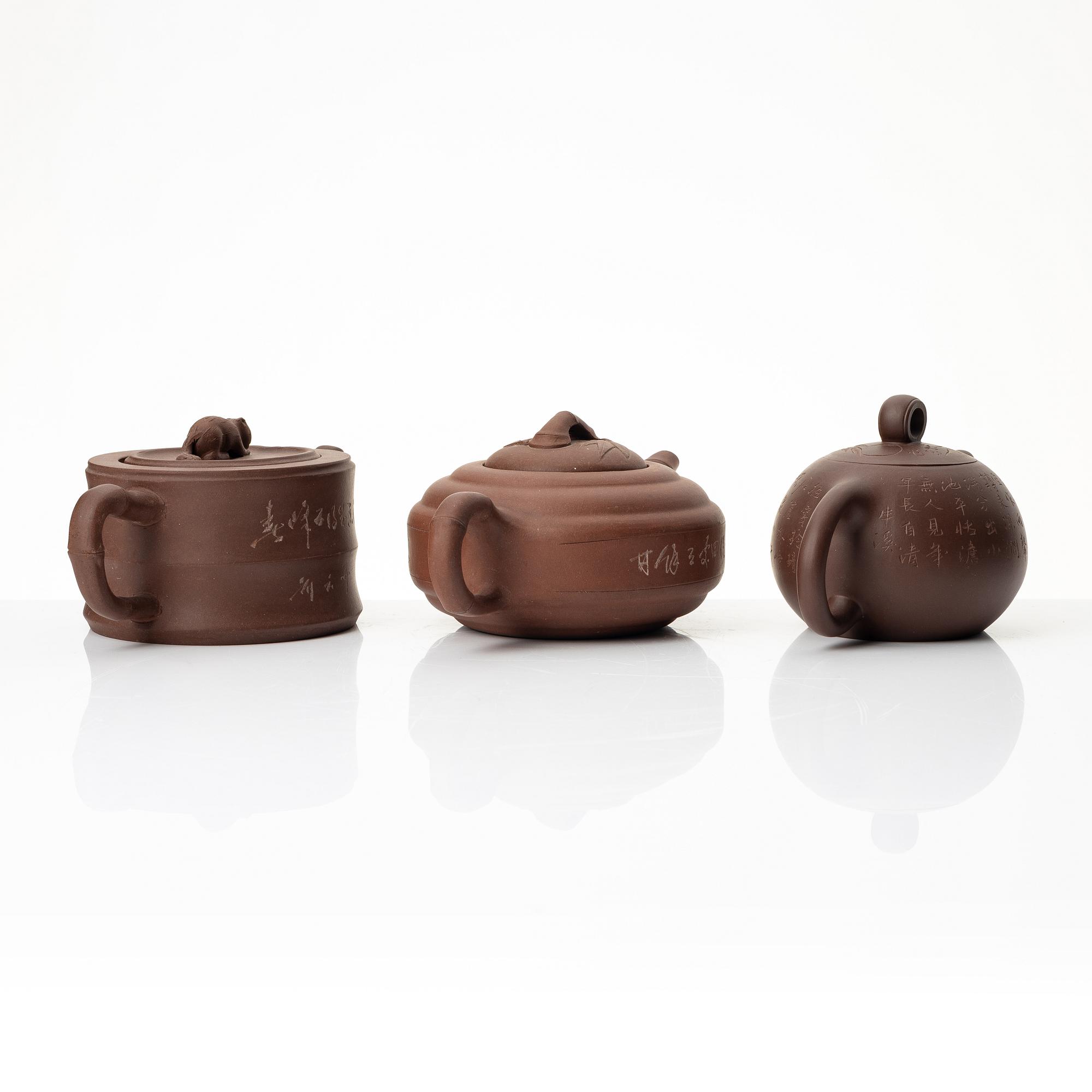 A group of three Chinese yixing teapots, 1960-80s.
