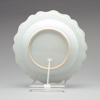 A set of seven armorial famille rose soup dishes, Qing dynasty, Qianlong (1736-95).