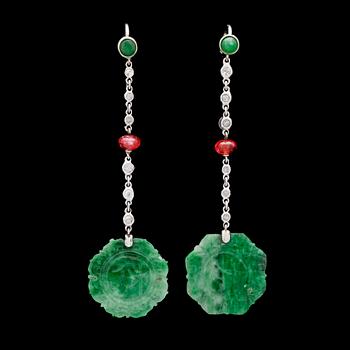253. EARRINGS, carved jade, rubies and small diamonds.