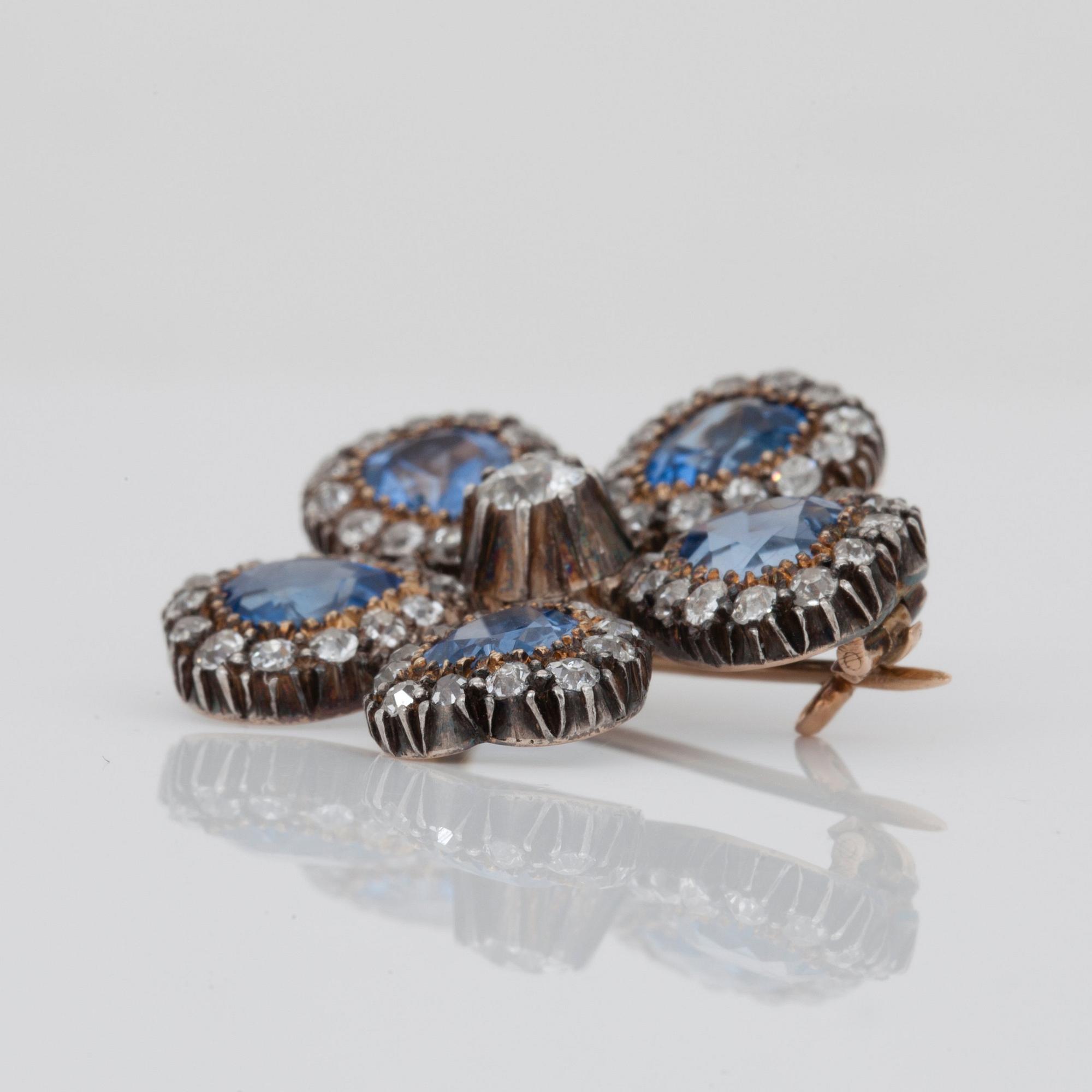 A heart shaped sapphire and old-cut diamond brooch/pendant.