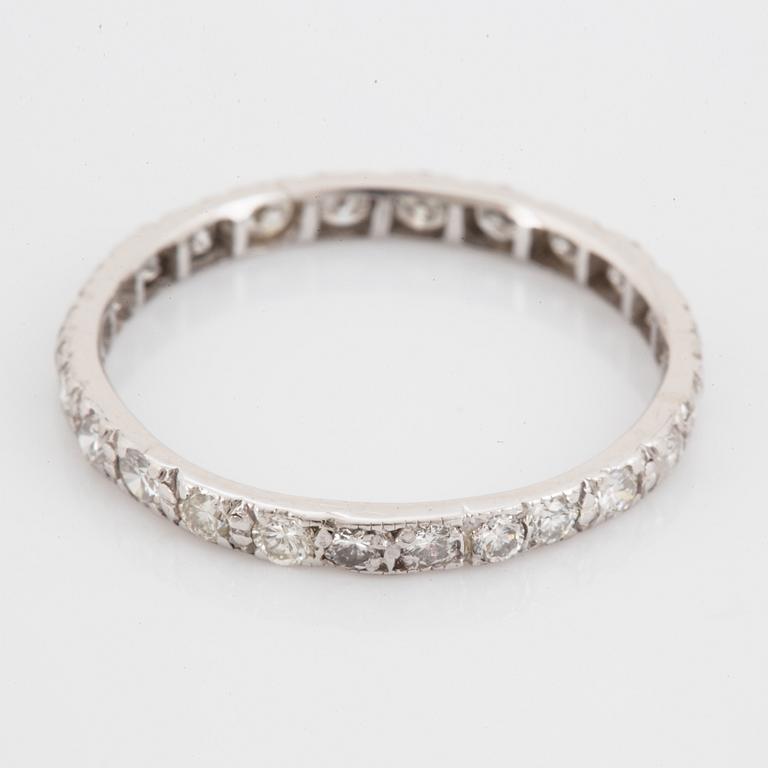 White gold brilliant-cut diamond eternity ring.