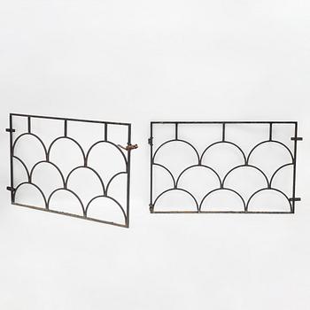 A pair of cast iron gates, 1930's.