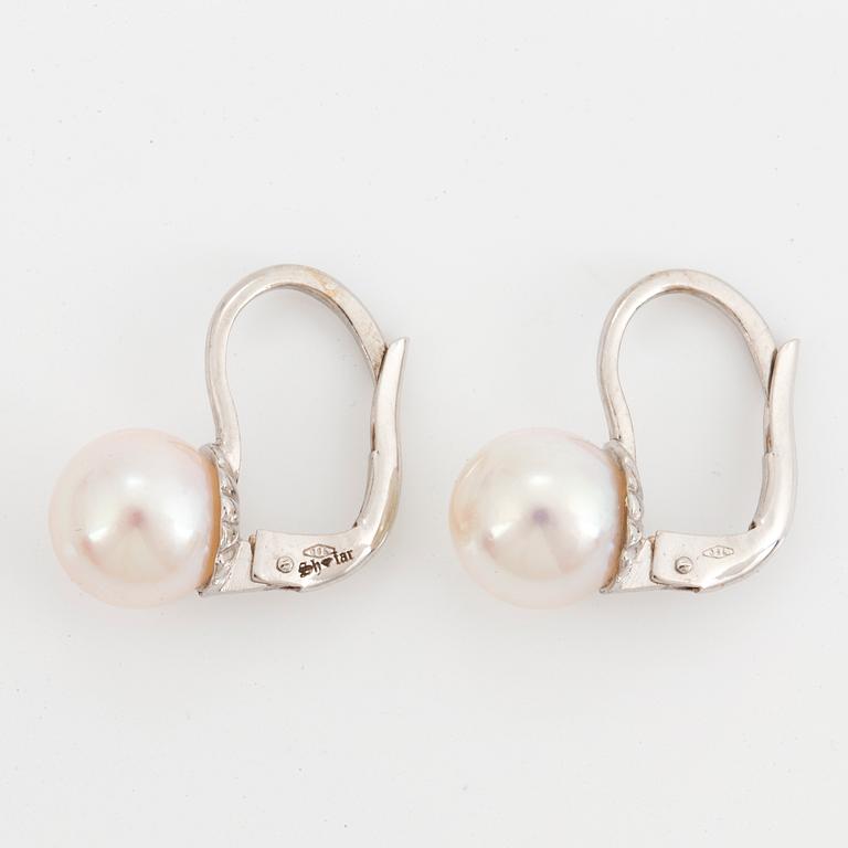 Cultured akoya pearl earrings.