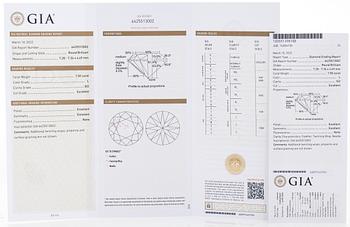 A pair of 18K white gold earrings and brilliant cut diamonds.