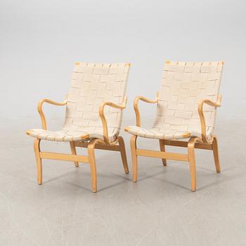 Bruno Mathsson, a pair of "Eva" armchairs for DUX, late 20th century.