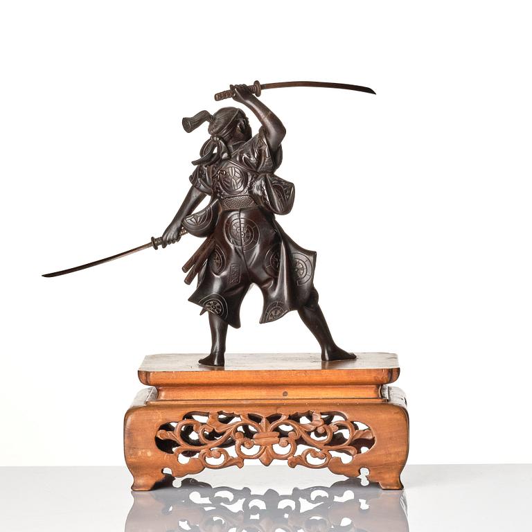 A Japanese bronze sculpture of a samurai warrior, presumably Taisho, or later. Signed.