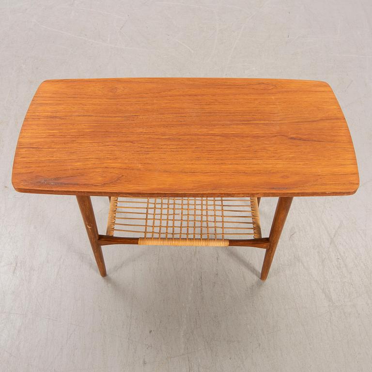 A teak and rattan 1960s coffee table.