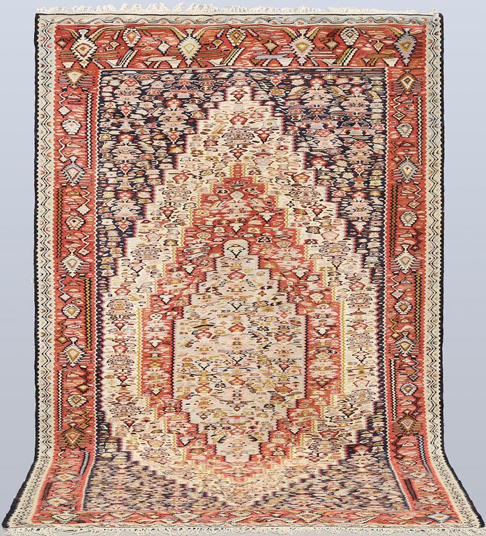 A semi-antique Kilim rug, Senneh, c. 230 x 147 cm.