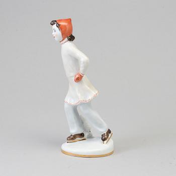 A early 20th century porcelain figurine from Russia.