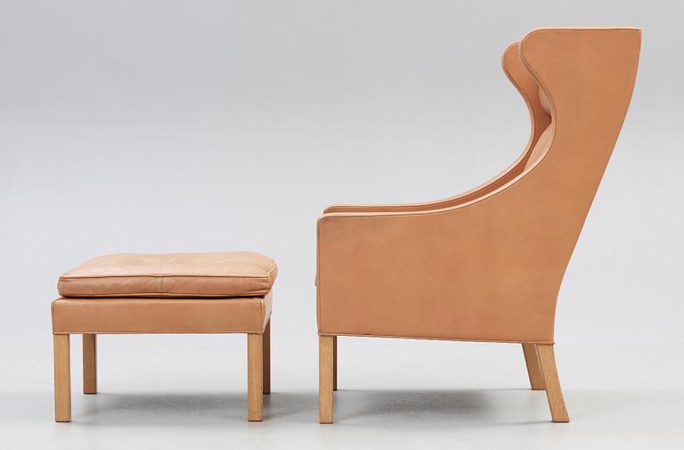 A Børge Mogensen armchair and ottoman, Fredericia Stolefabrik, Denmark, model 2204 and 2202.