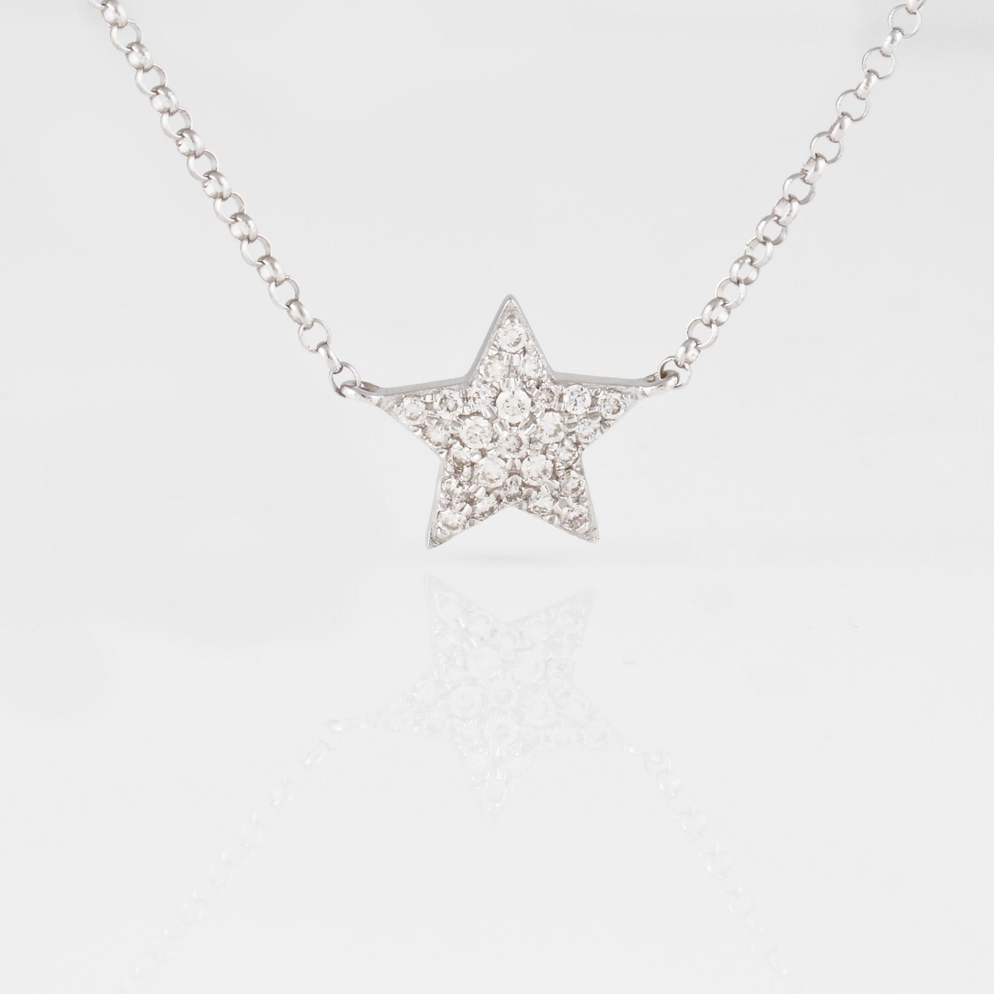 COLLIER, 18K vitguld med briljantslipade diamanter ca 0.15 ct. Vikt 1,8 gram.